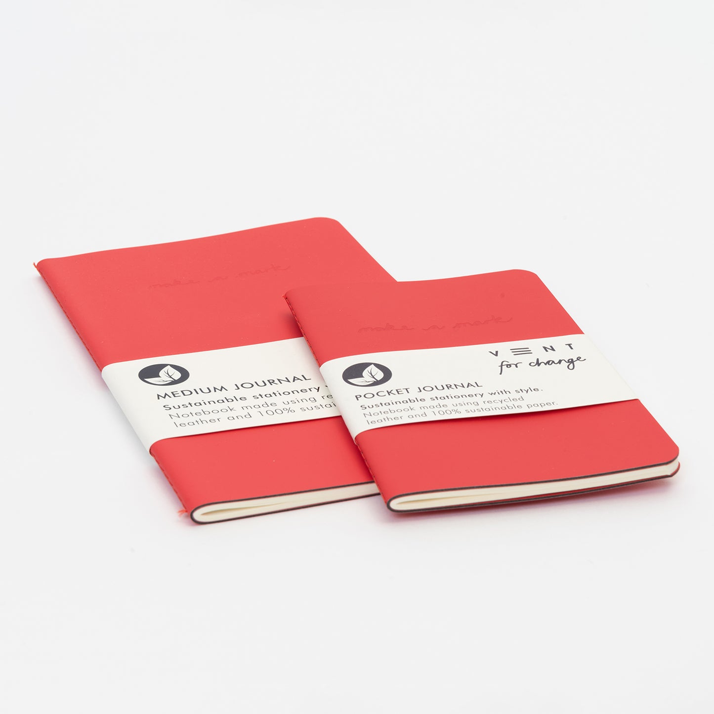 showing the 2 sizes of a pocket mini journal and a medium journal in red