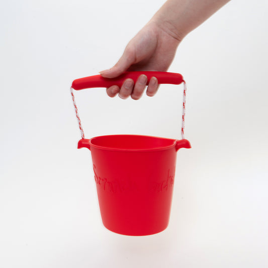 red silicone bucket with string handle