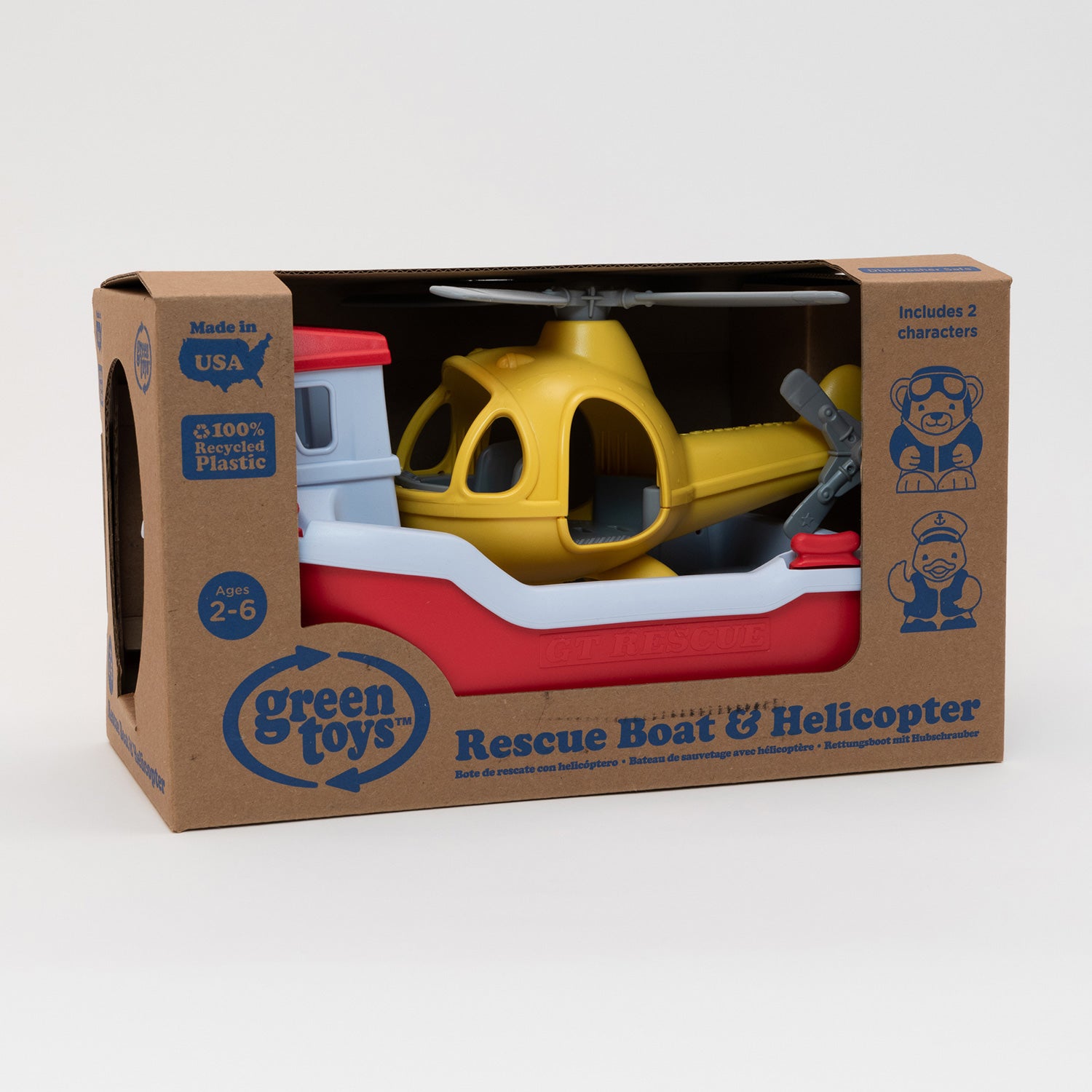 The Green Toys Rescue Boat and Helicopter packaged in a brown cardboard branded box.