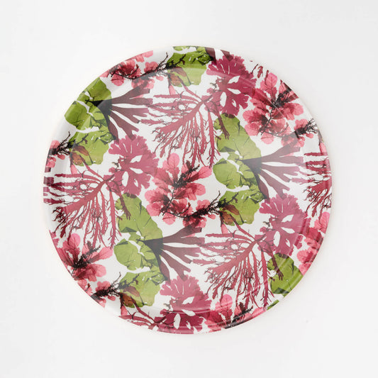 round tray with seaweed pressing design in pinks and greens