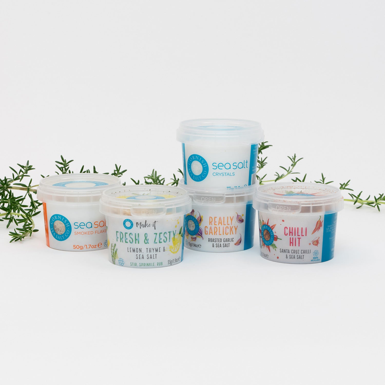 A selection of Cornish Sea Salt pinch pots pictured on a white background.