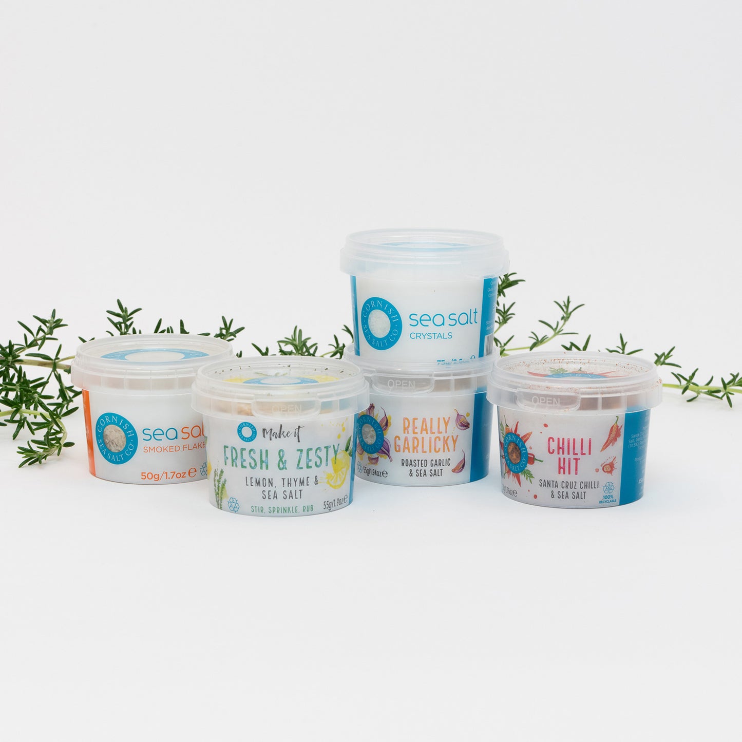 A selection of Cornish Sea Salt pinch pots on a white background.