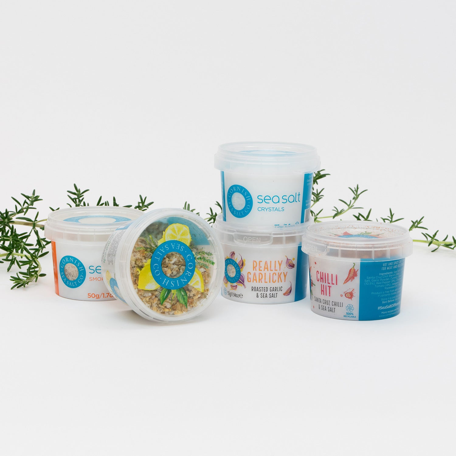 A selection of Cornish Sea Salt pinch pots on a white background.