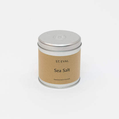 St Eval Sea Salt Candle Tin with tin lid. Plain earthy card label with St. Eval, Sea Salt, Made in Cornwall.