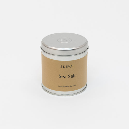 St Eval Sea Salt Candle Tin with tin lid. Plain earthy card label with St. Eval, Sea Salt, Made in Cornwall.