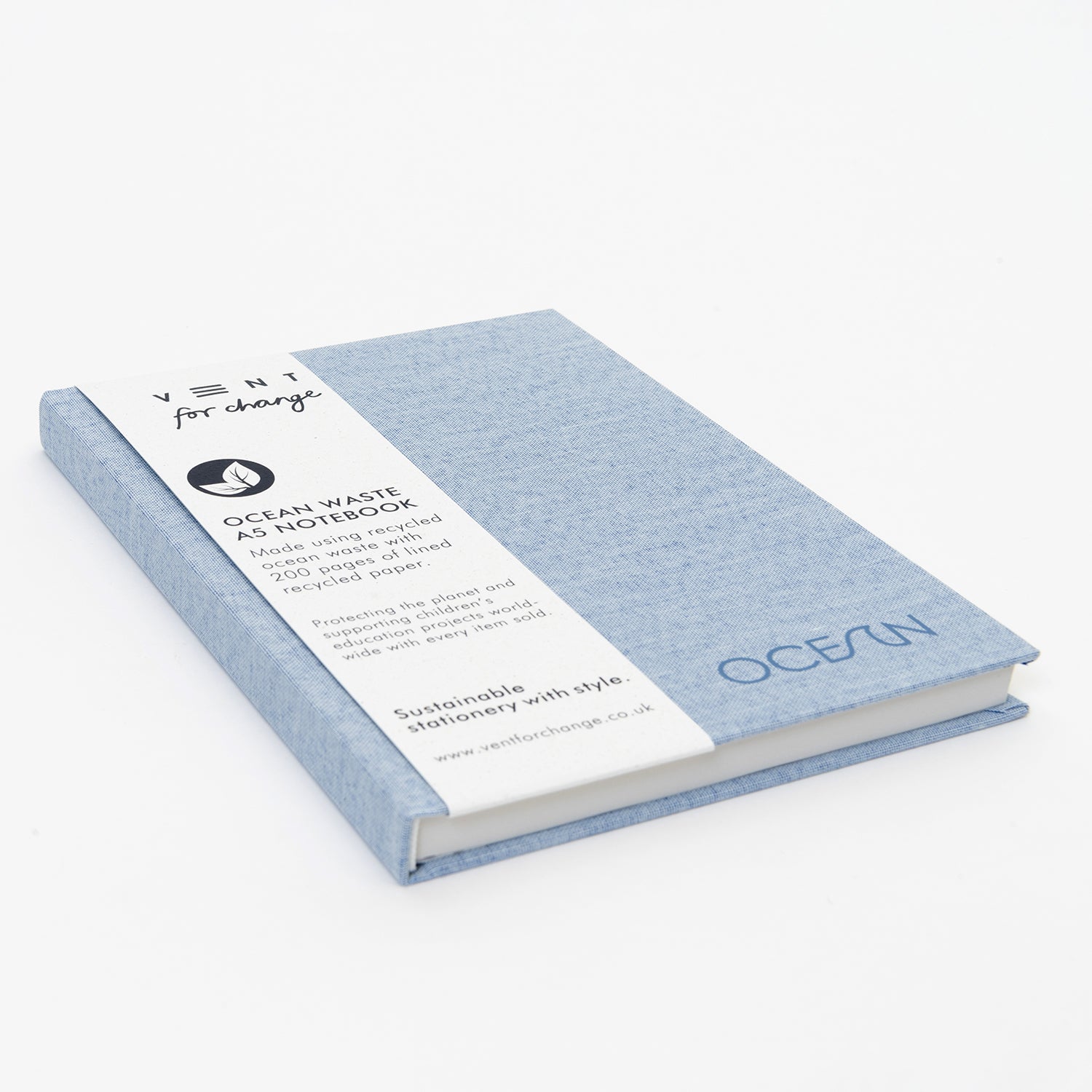 SEa blue notebook lying flat showing belly band packaging