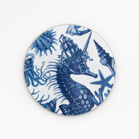 round coaster white background with blue illustration of a seahorse wearing a tall ship as a crown