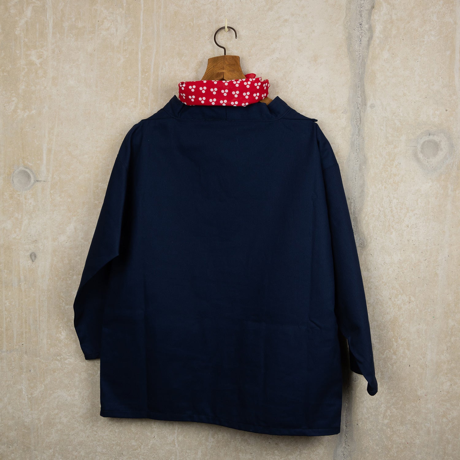 Back view navy blue cotton smock and a crew neck