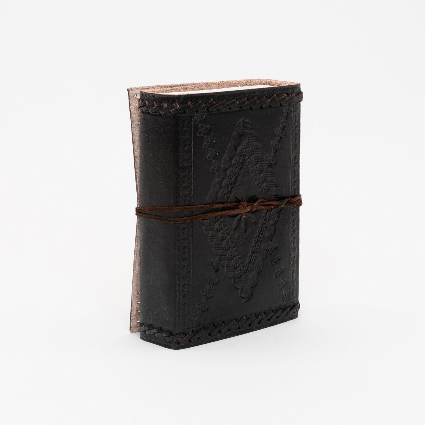 A view of the back of the dark brown leather bound journal.