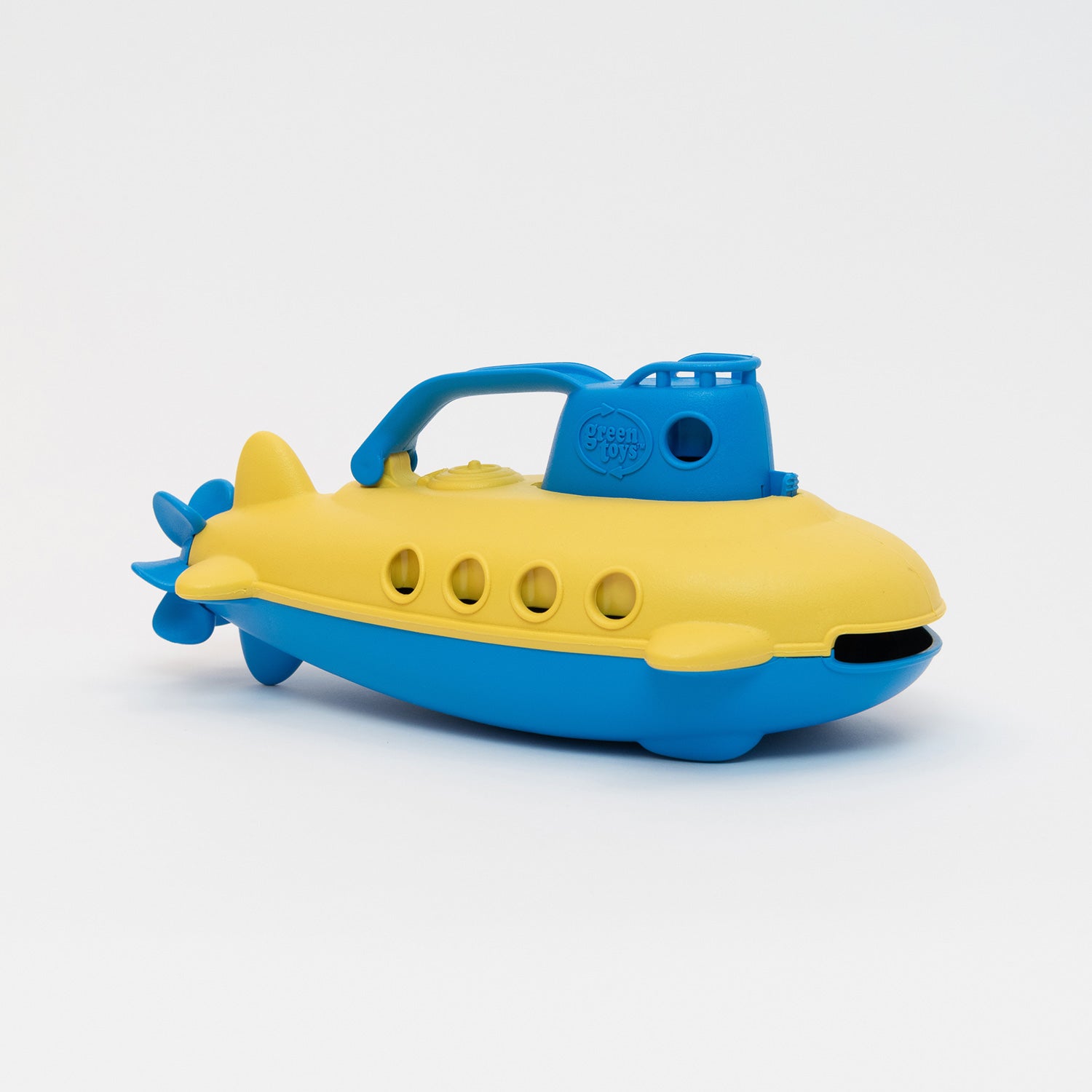 A photo of the yellow and blue Green Toys Submarine bath toy, unboxed.