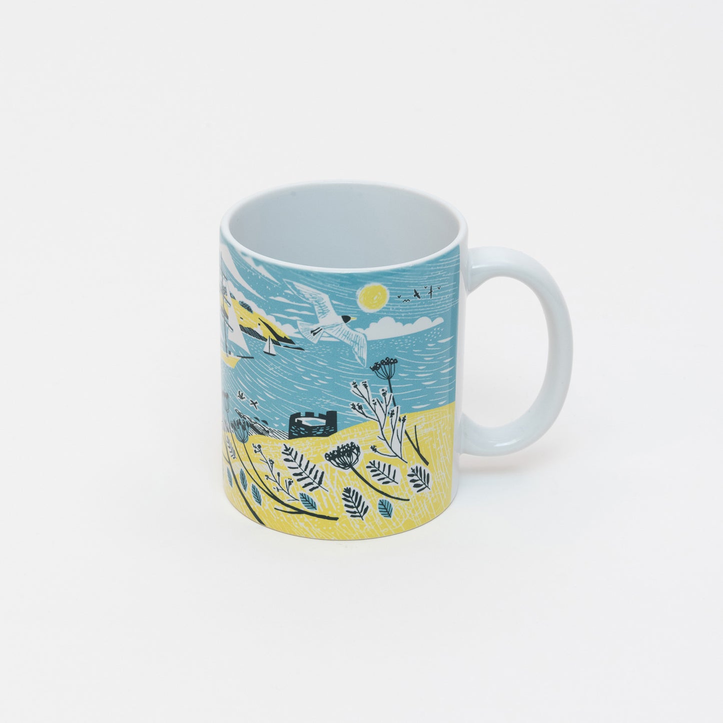 Back of the Falmouth Tall Ships Mug featuring an illustration of a tall ship in full sail in blue, yellow and white.