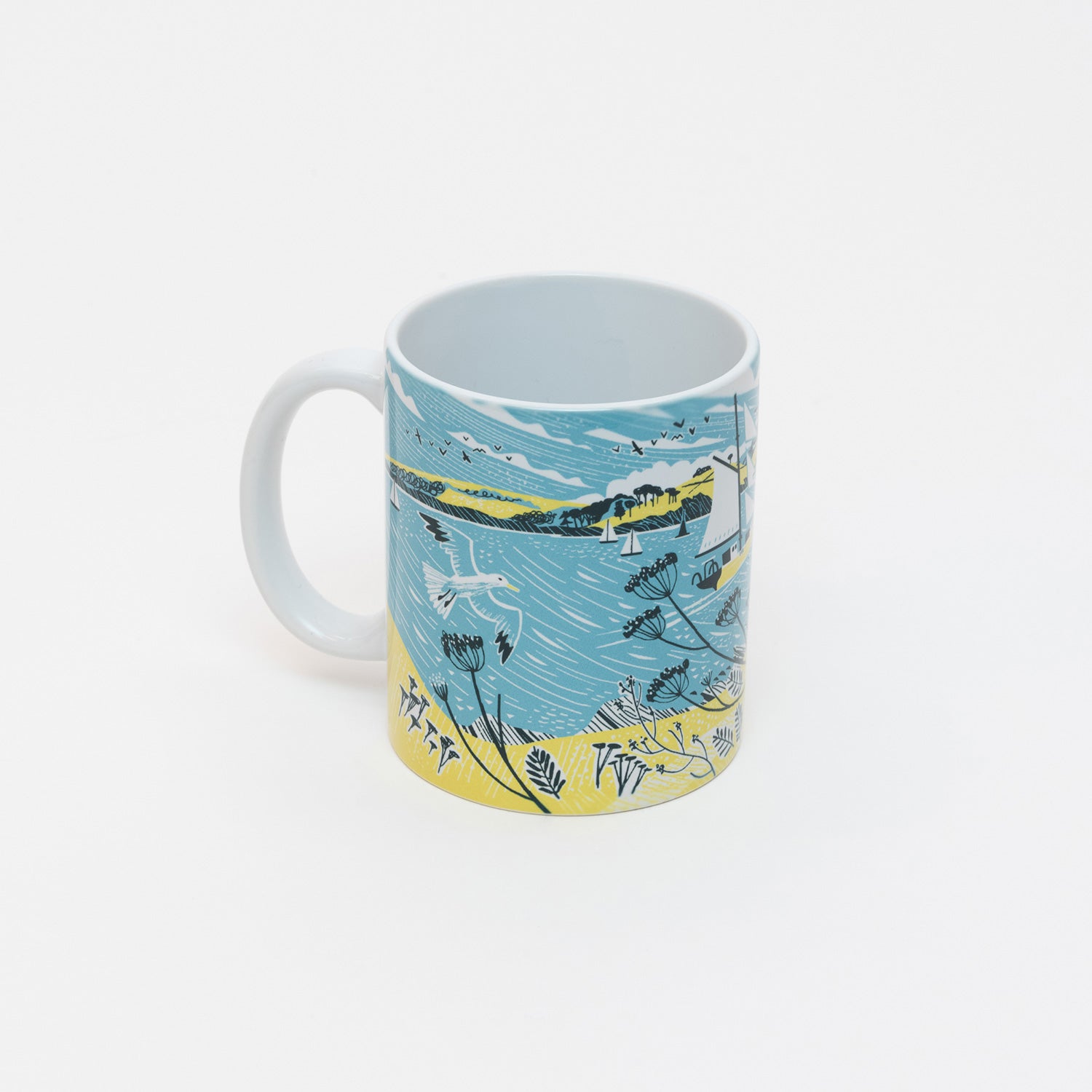 Front of the Falmouth Tall Ships Mug featuring an illustration of a tall ship in full sail in blue, yellow and white.