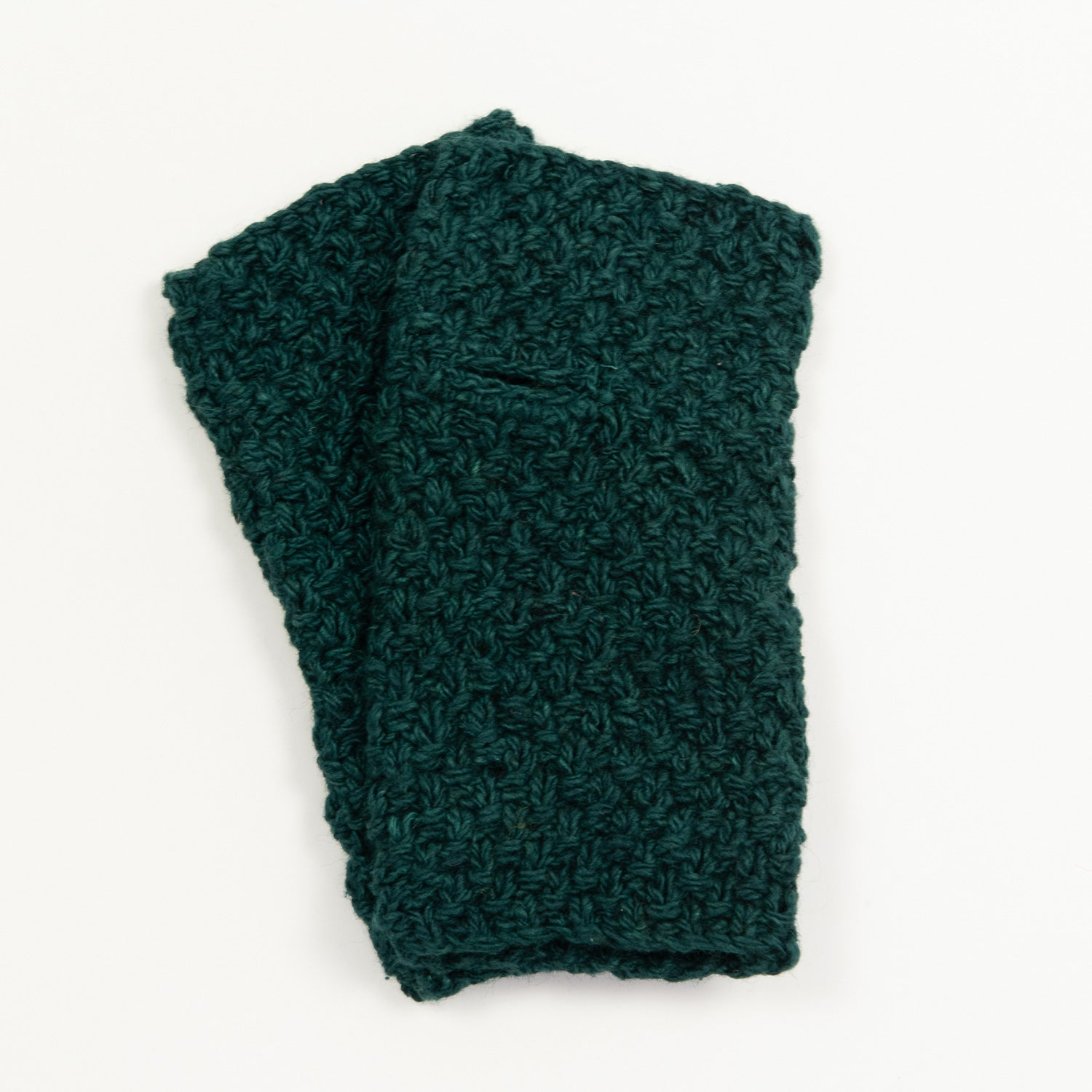 Two teal green wristwarmers pictured on a white background.