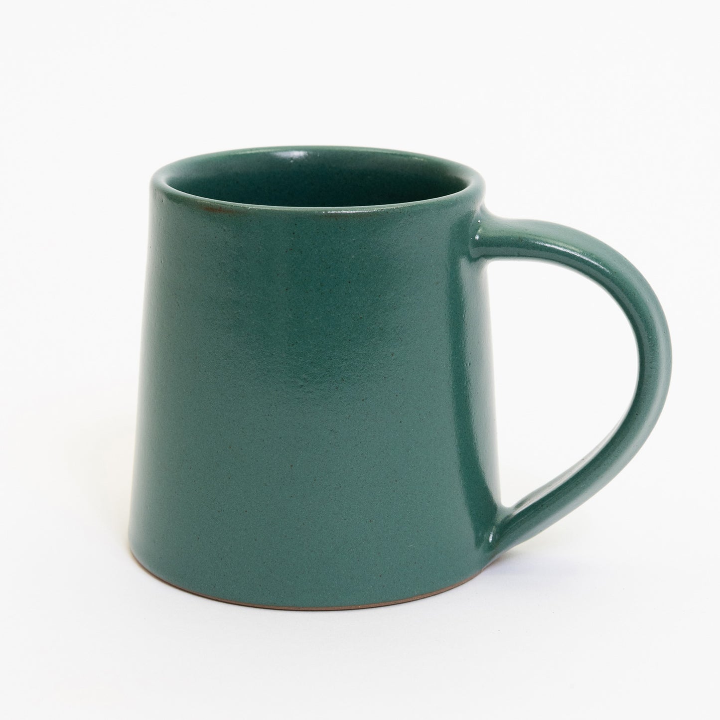 A teal coloured stoneware mug pictured on a white background.