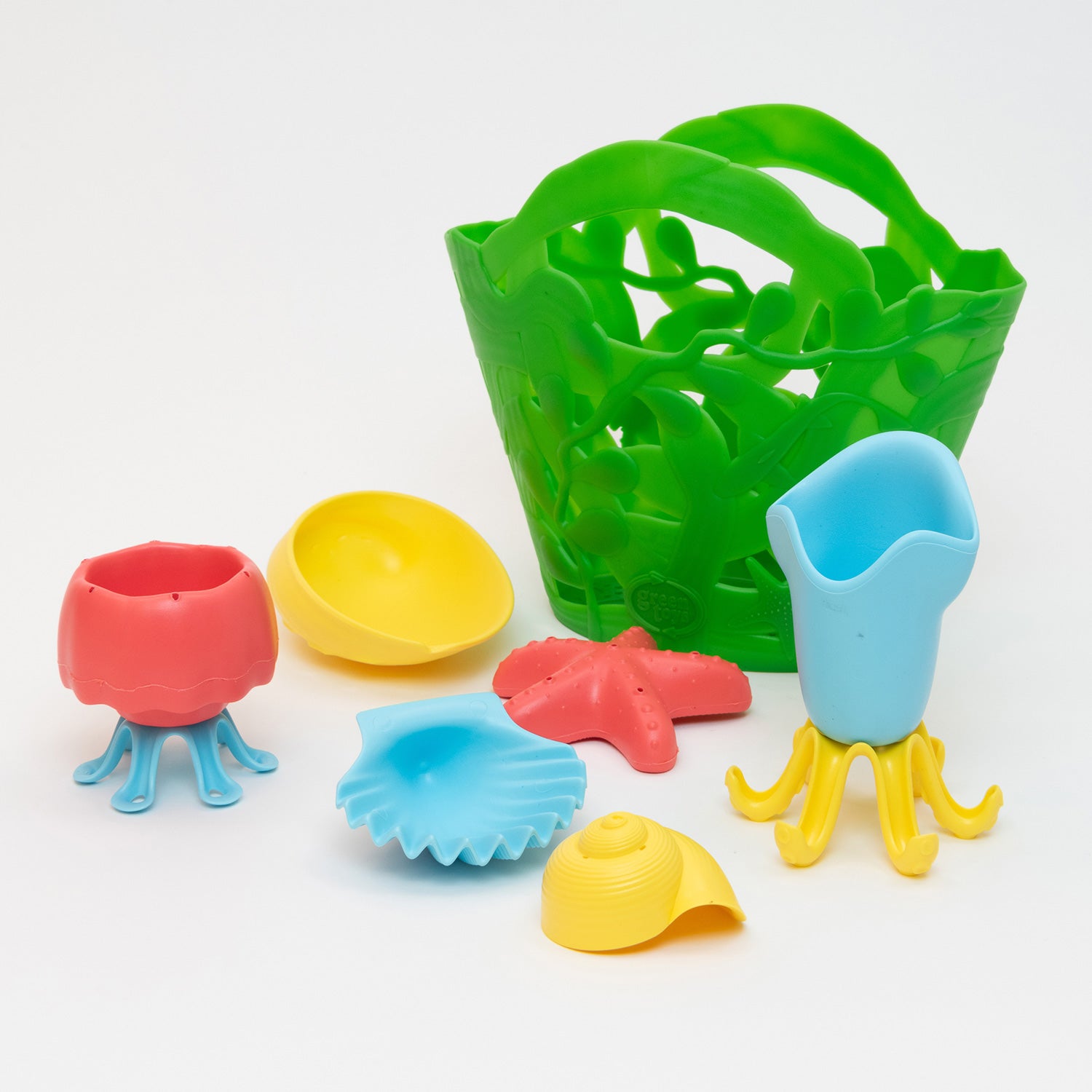 Green Toys Tide Pool Bath Set. Green Plastic seaweed bucket with coloured plastic sealife toys 7 peice set. Including yellow shells, orange starfish & jellyfish, blue shell and octopus.