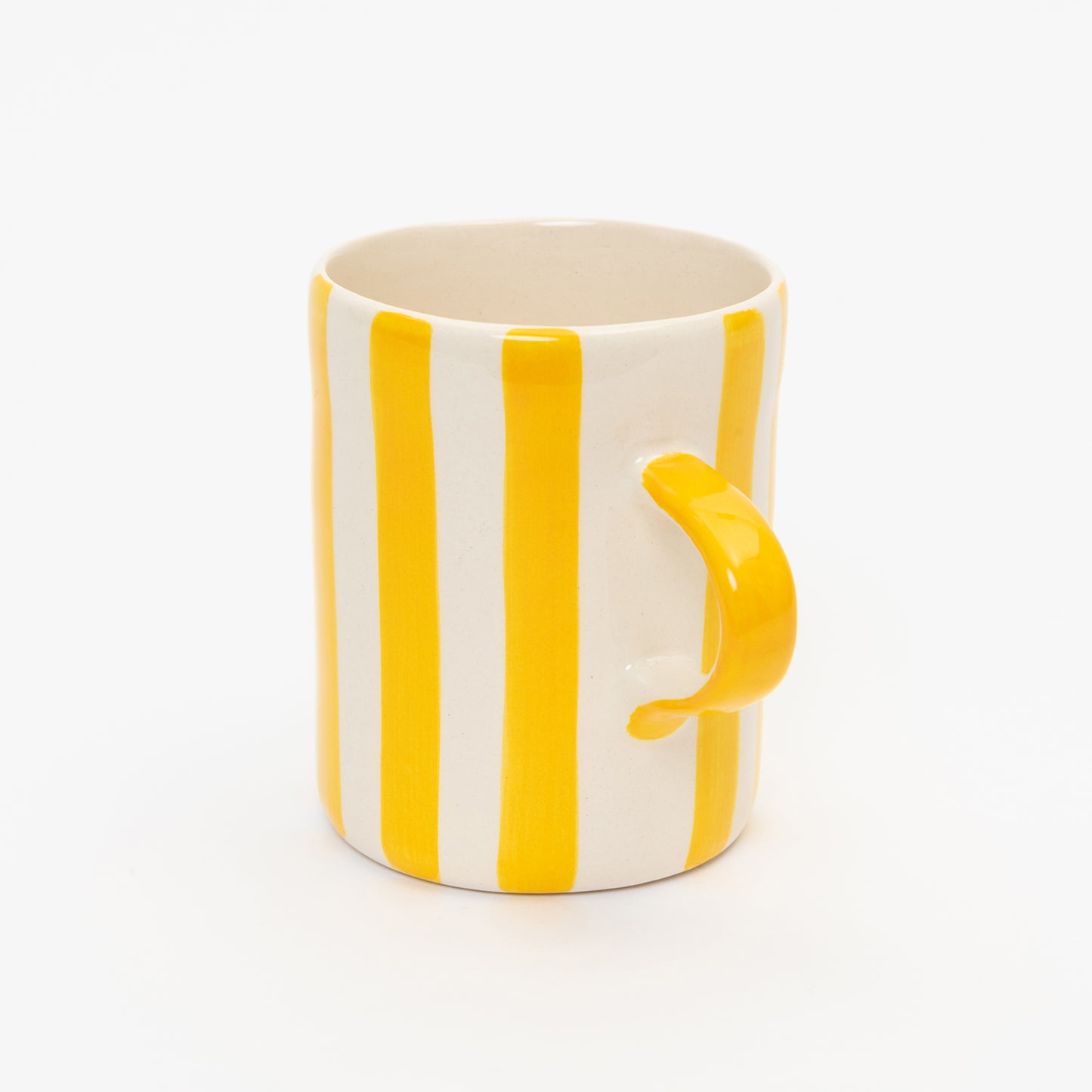 Yellow and white striped mug with yellow handle